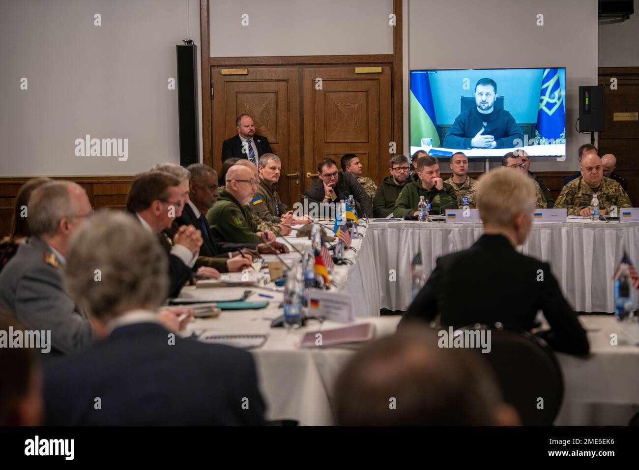 Ramstein-Miesenbach, Germany. 20 January, 2023. Ukraine President Volodymyr Zelenskyy speaks live via video to the eighth Ukraine Defense Contact Group meeting at Ramstein Air Base, January 20, 2023 in Ramstein-Miesenbach, Rhineland-Palatinate, Germany. The meeting or 50 nations and organizations decides the best path of providing military support to Ukraine.  Credit: TSgt. Jack Sanders/DOD Photo/Alamy Live News Stock Photo