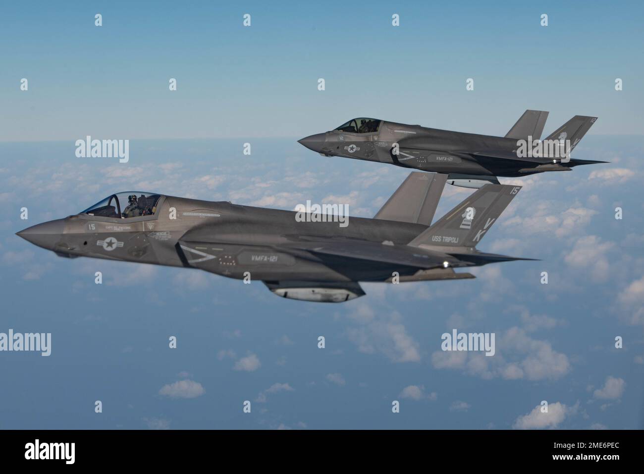 Pacific Ocean, United States. 19 January, 2023. A pair of U.S. Marine Corps F-35B Lightning II stealth fighter aircraft with the Green Knights of Marine Fighter Attack Squadron 121, approach an Air Force KC-135 Stratotanker to refuel during routine operations, January 19, 2023 over the Pacific Ocean.  Credit: A1C Tylir Meyer/U.S. Air Force/Alamy Live News Stock Photo