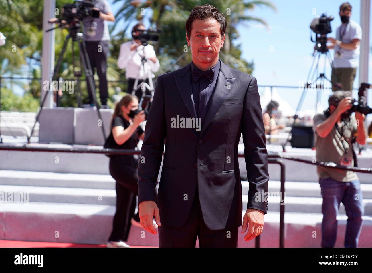 Simon Rex poses for photographers upon arrival at the premiere of the ...