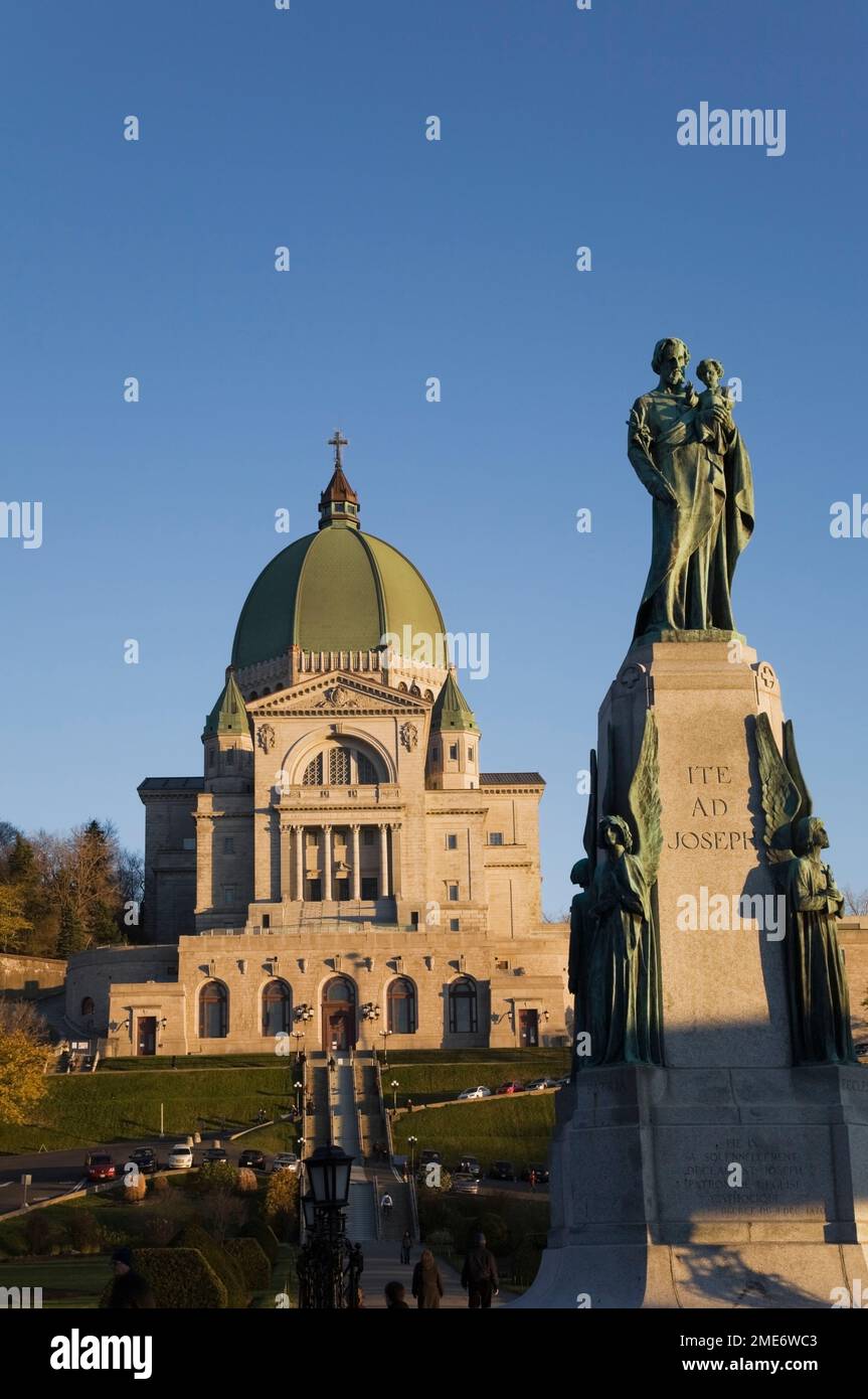 Religious statue in front of Saint Joseph's Oratory in autumn, Montreal, Quebec, Canada. Stock Photo