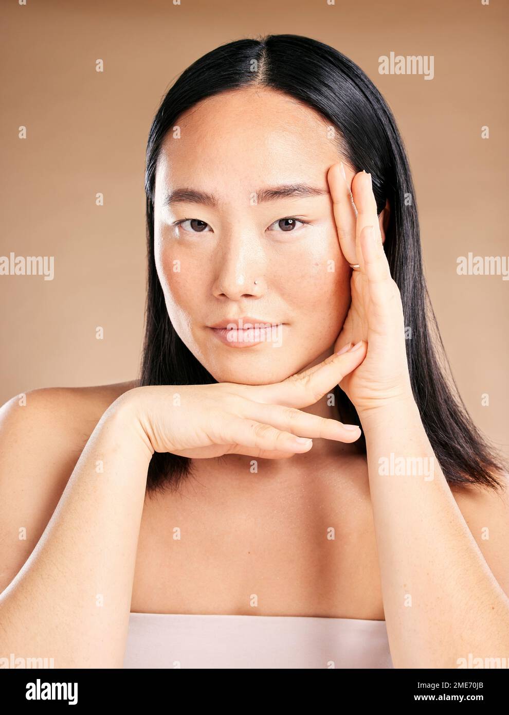 Asian woman, beauty portrait and hands for skincare wellness