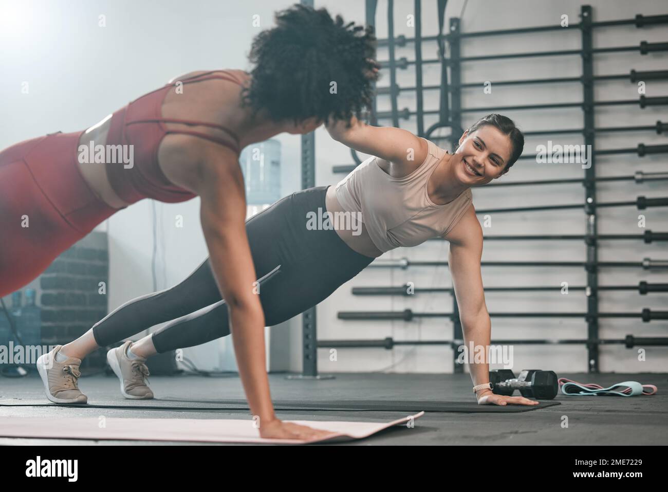 Gym floor, high five and exercise people doing plank workout