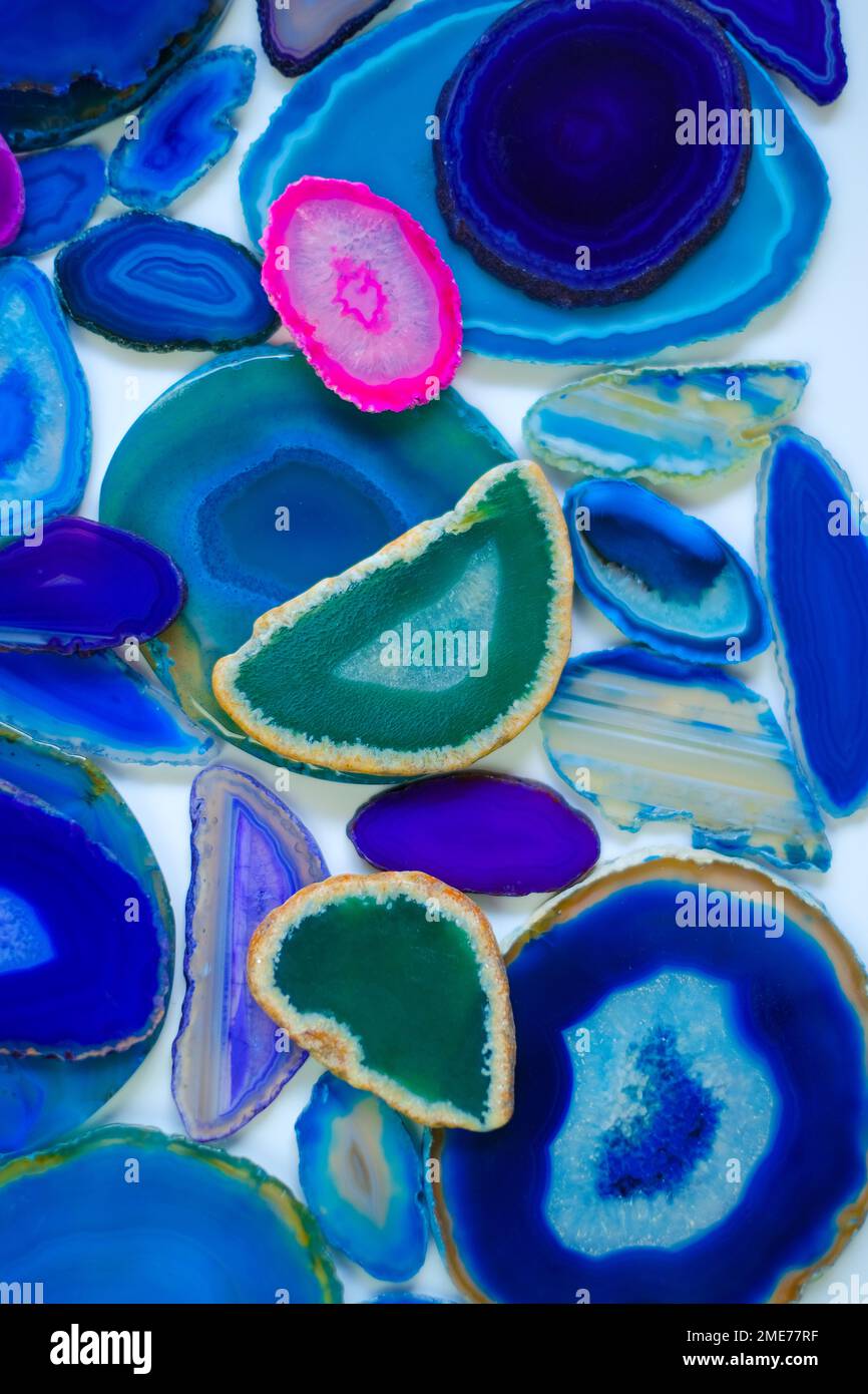 slices of natural stone . Agates set in blue and green colors.Texture