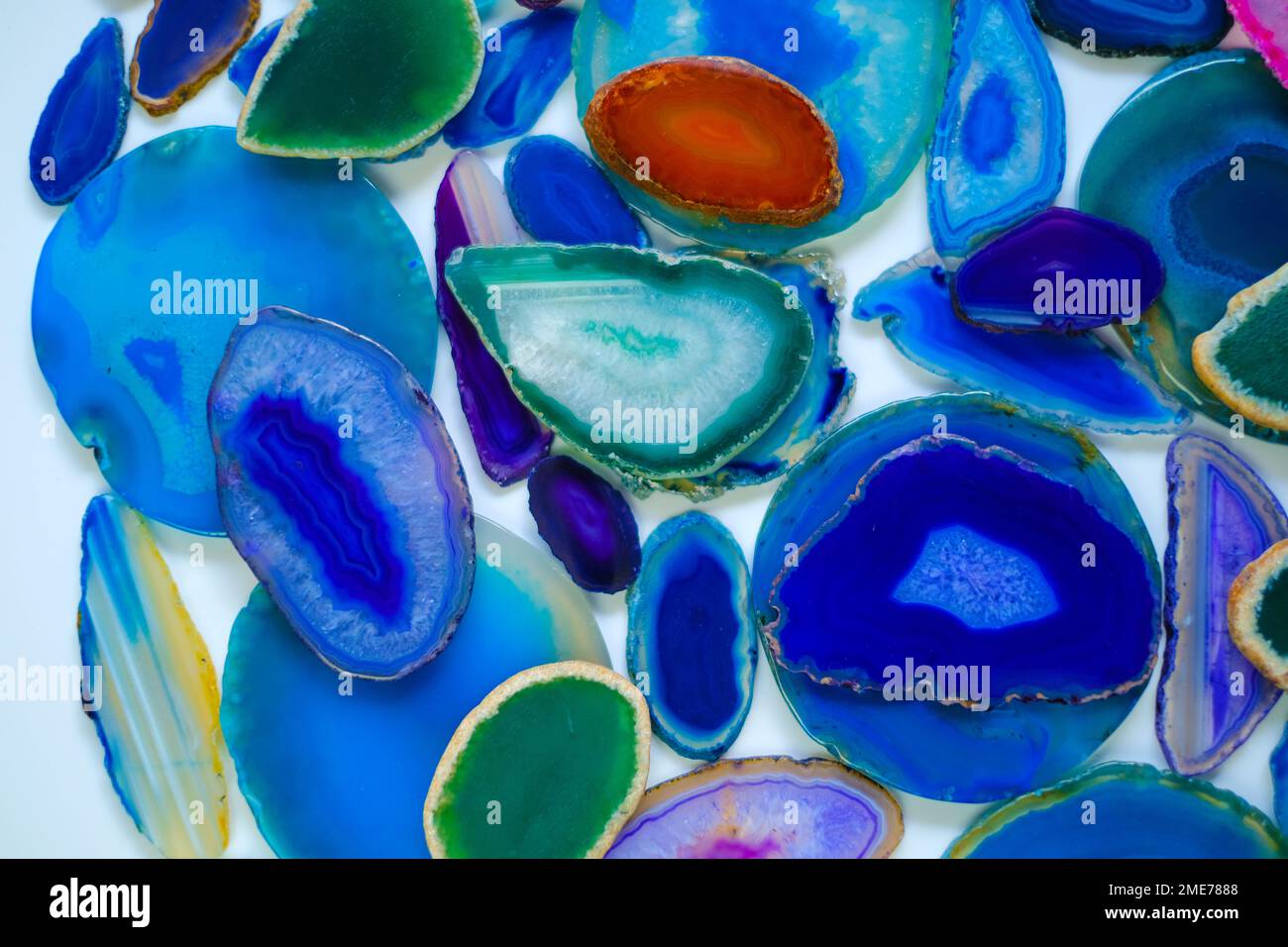 Wallpaper agate stones in blue and green colors.slices of natural stone