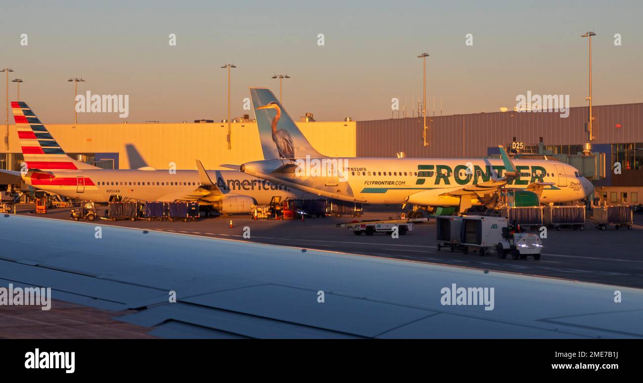 Detroit, Michigan Frontier and American Airlines jets on the ground