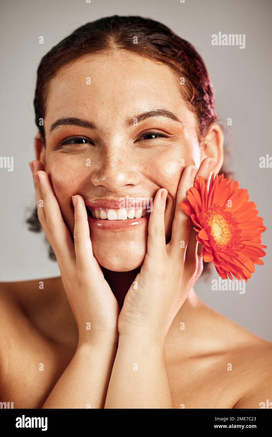 Happy portrait, beauty face and flower for skincare woman with