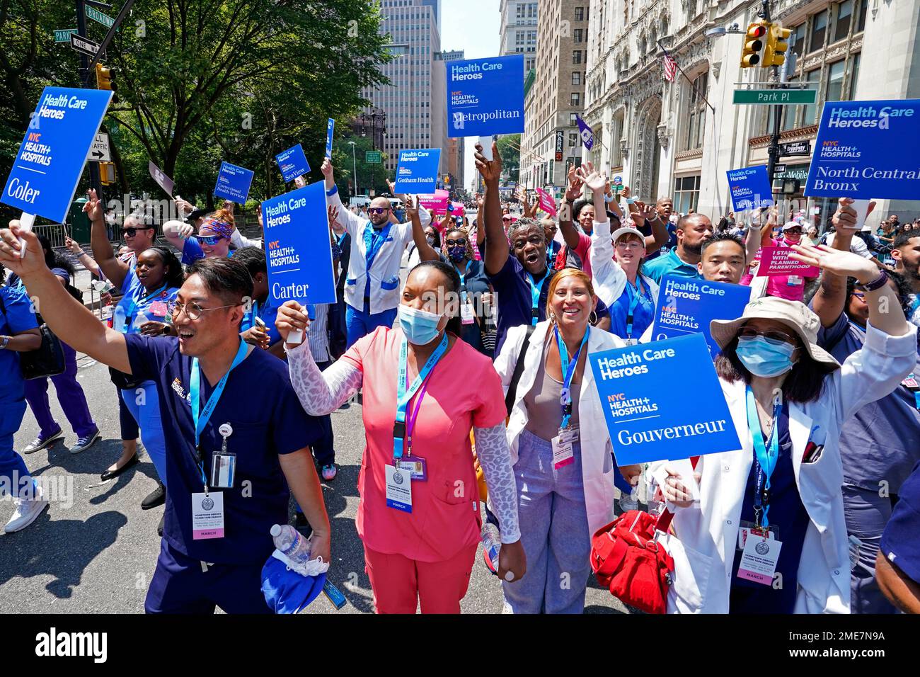 Participants march up the Canyon of Heroes during parade honoring ...