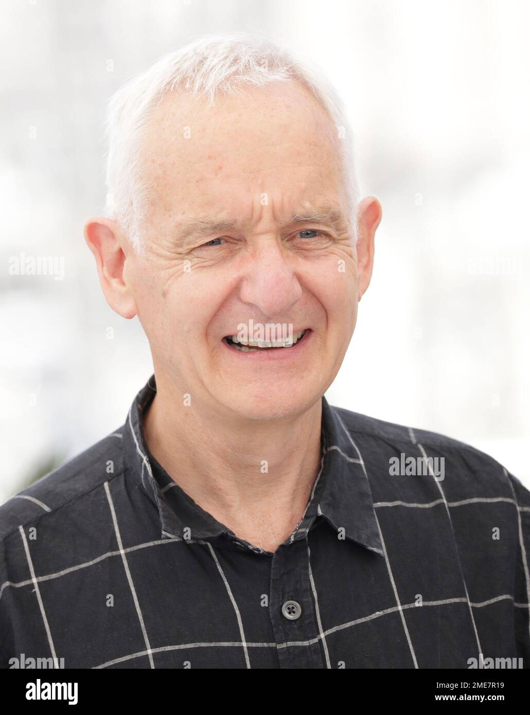 Producer John Archer poses for photographers at a photo call for the