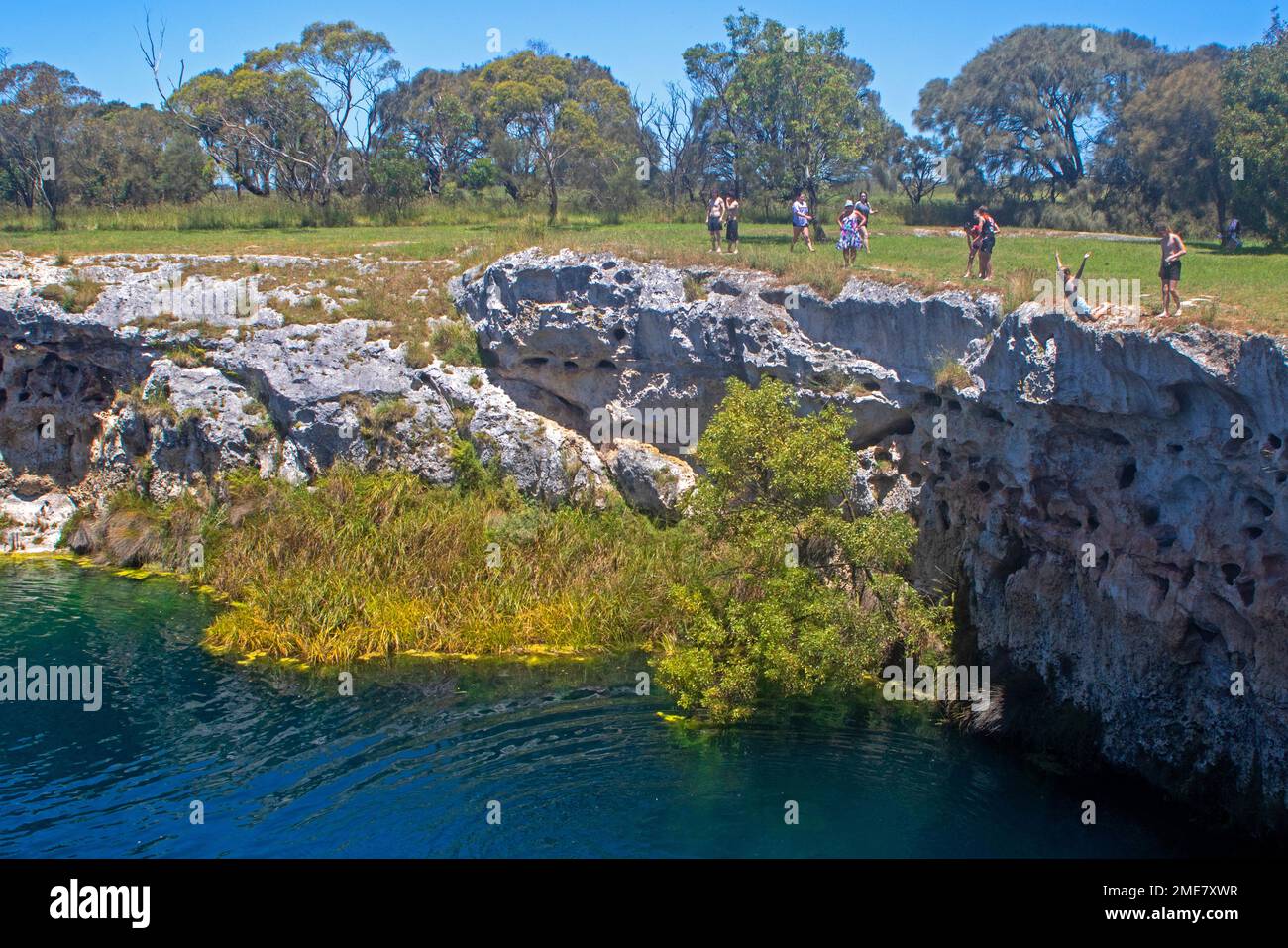 Leaping into Little Blue Lake, Mount Gambier Stock Photo