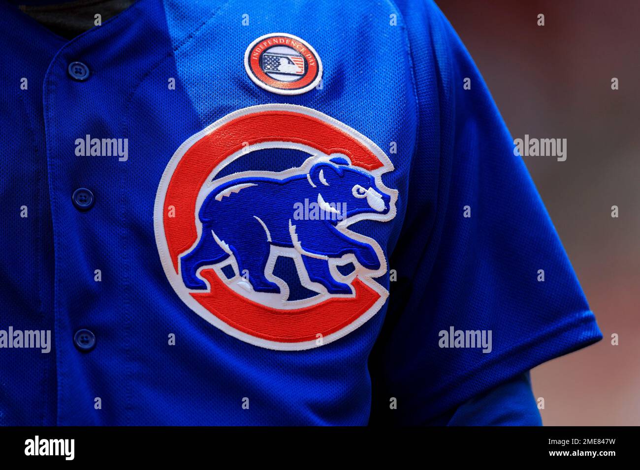 The Chicago Cubs' logo is seen on a jersey of a player during a baseball  game