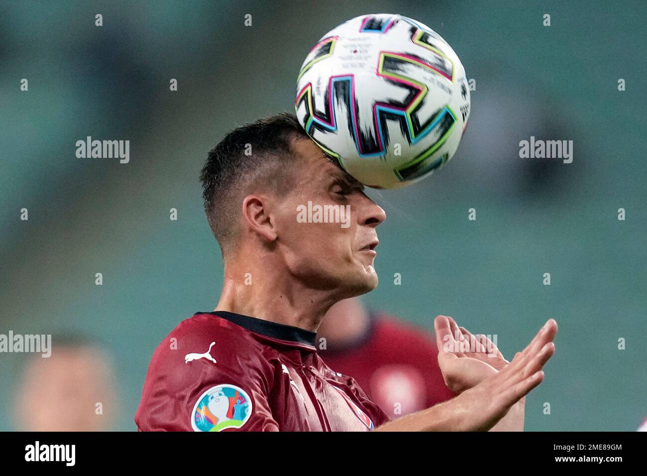 Czech Republic's Jan Boril heads the ball during the Euro 2020 soccer  championship quarterfinal match between Czech Republic and Denmark, at the  Olympic stadium in Baku, Saturday, July 3, 2021. (AP Photo/Darko