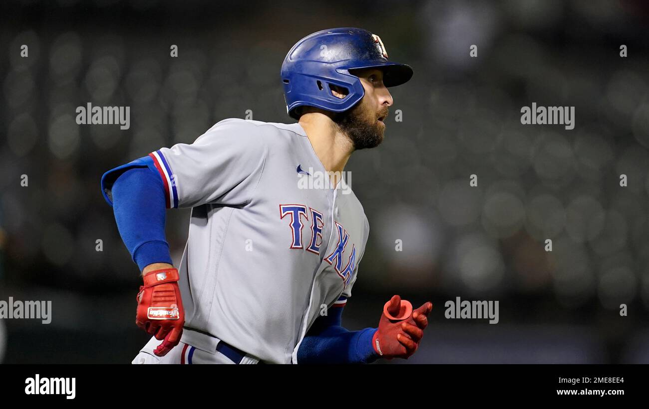 Texas Rangers' Joey Gallo is congratulated by teammates during a baseball  game against the Oakland Athletics in Oakland, Calif., Thursday, July 1,  2021. (AP Photo/Jeff Chiu Stock Photo - Alamy