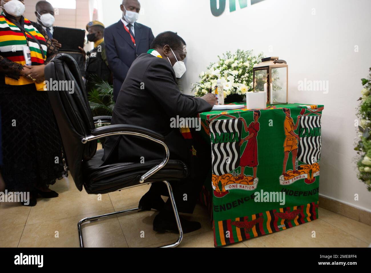 Zimbabwean President Emmerson Mnangagwa, signs the book of condolences
