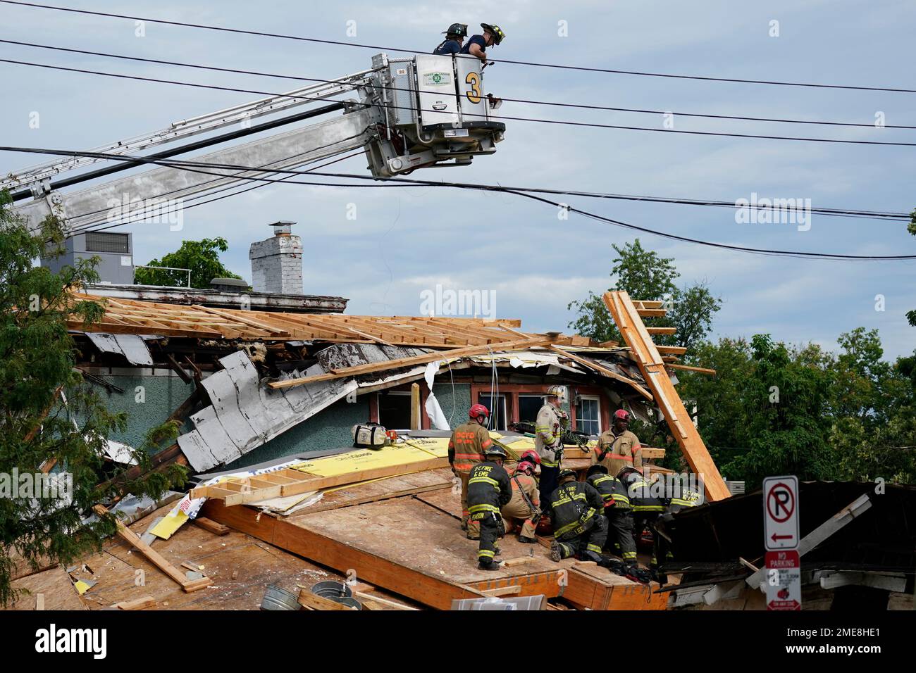 Emergency crews respond after a building under construction collapsed ...
