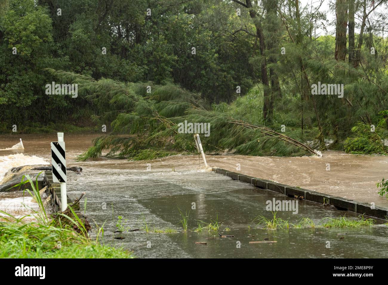 South Pine River flooding at Bunya Road crossing in March 2021 on the outskirts of Brisbane, Australia Stock Photo