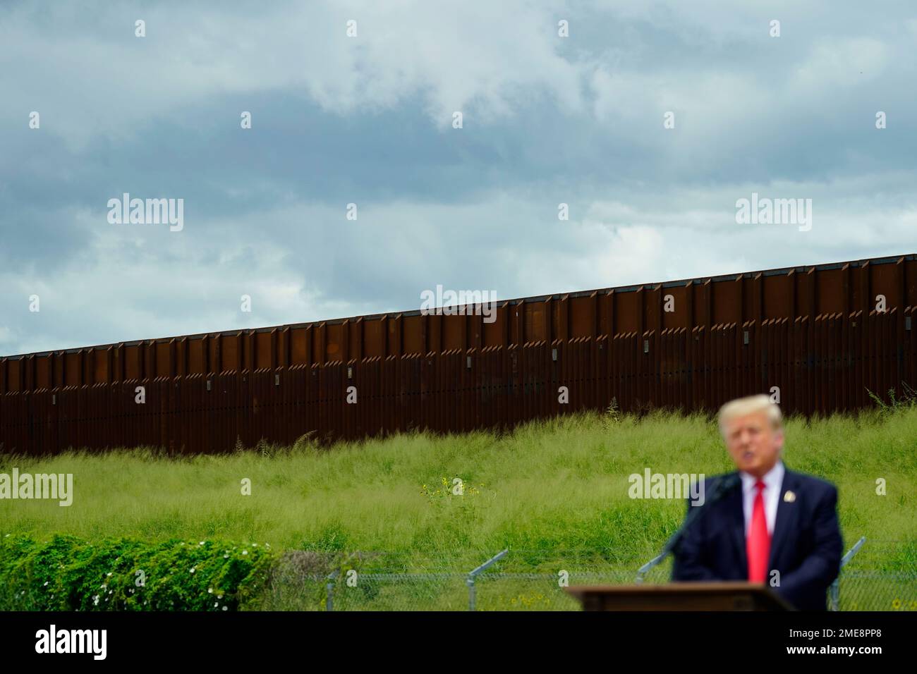 Former President Donald Trump speaks during a visit to an unfinished ...