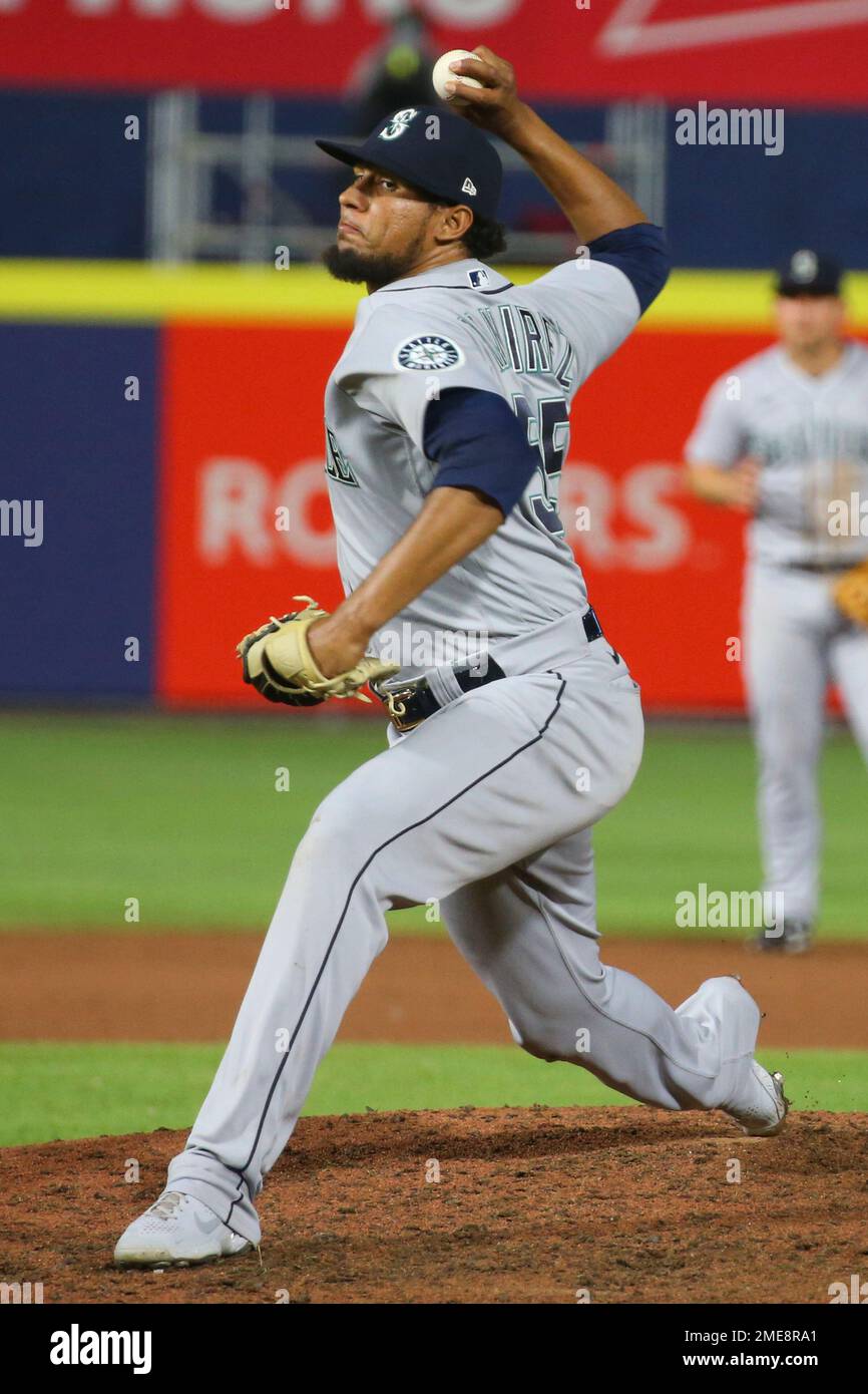 Seattle Mariners pitcher Yohan Ramirez throws to the Toronto Blue Jays