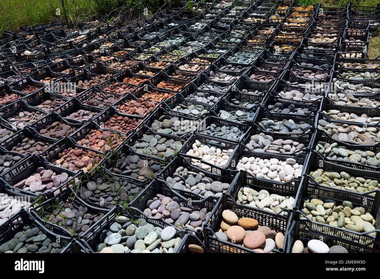 Collection of natural coloured stones used for art at Dreamwoods Park, hidden in the hills of Tuscany, designed by German artist Deva Manfredo, Italy. Stock Photo