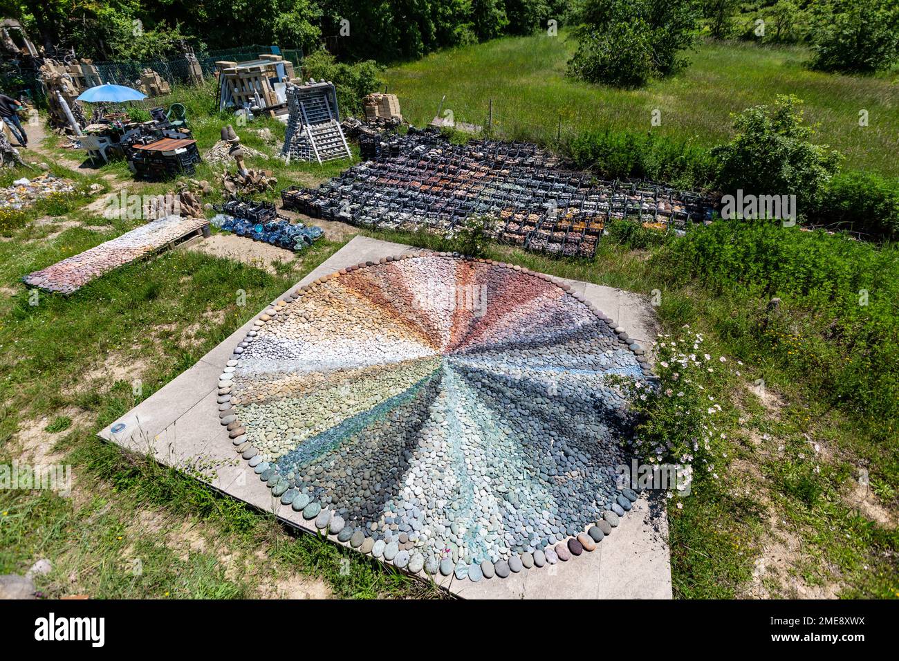Mosaic of naturally-coloured stones at the magical Dreamwoods Park, hidden in the hills of Tuscany, designed by German artist Deva Manfred, Italy. Stock Photo