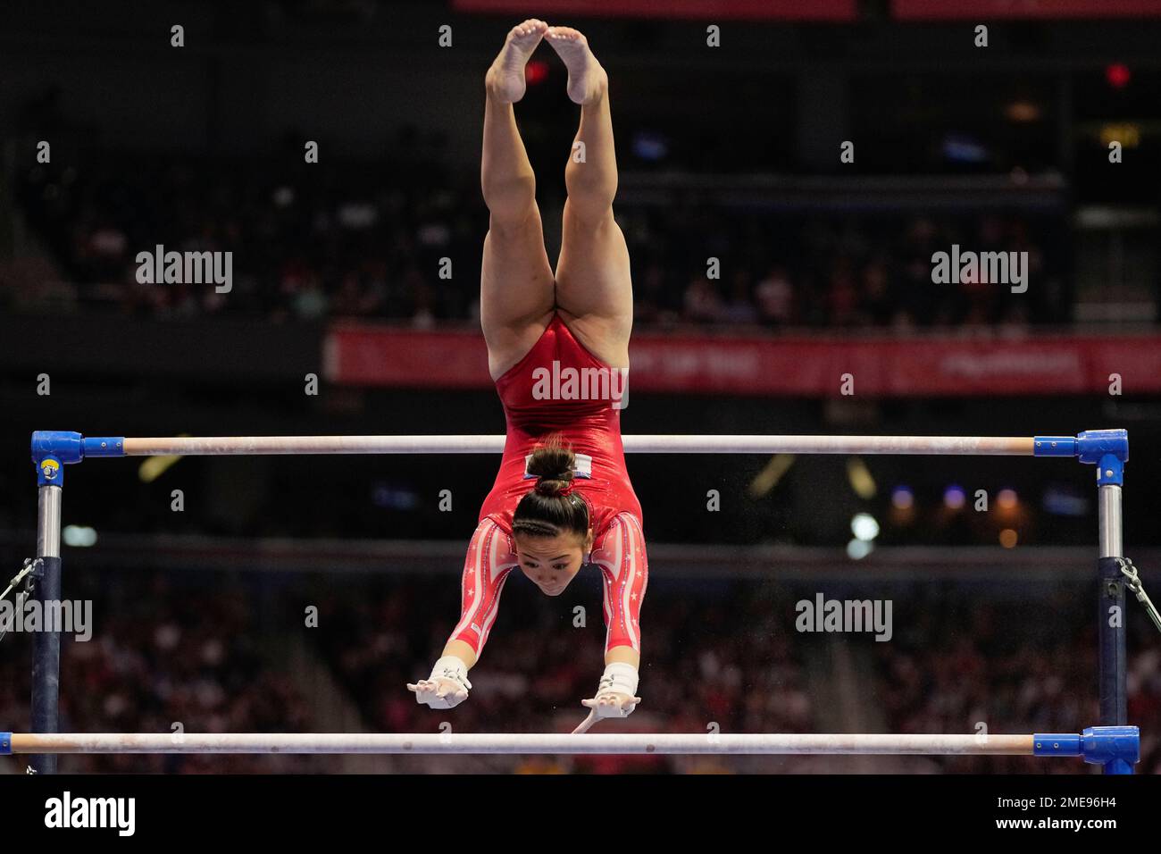 Suni Lee competes on the uneven bars during the women's U.S. Olympic