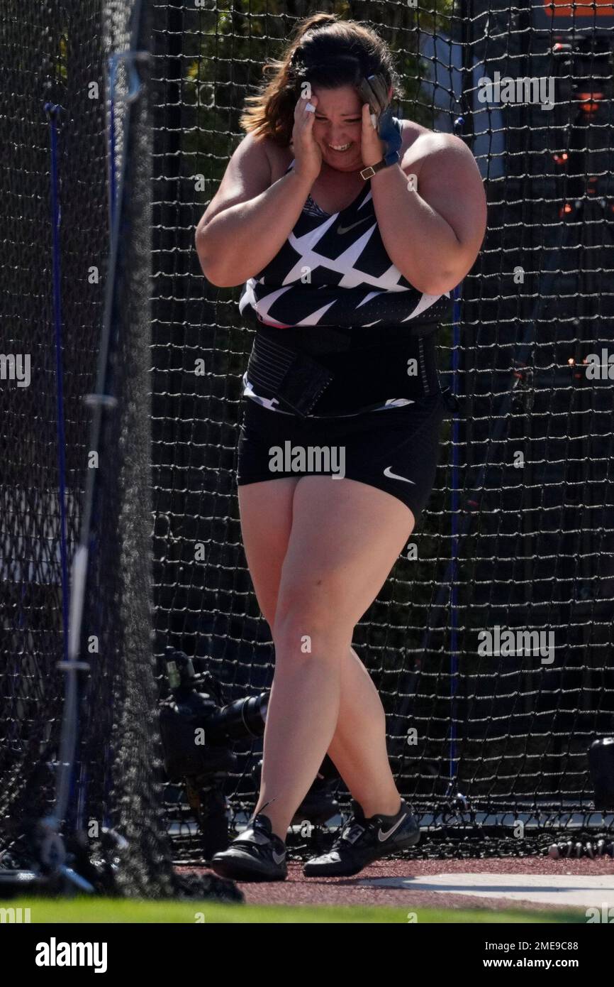Deanna Price reacts after setting a new American record during the finals of the women's hammer
