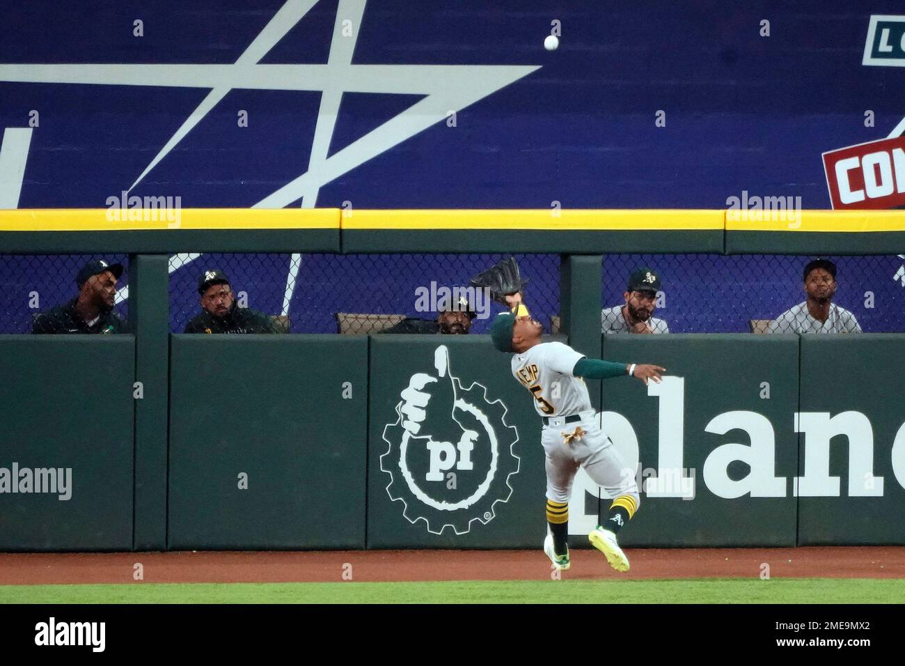 Oakland Athletics left fielder Tony Kemp catches a fly out hit by