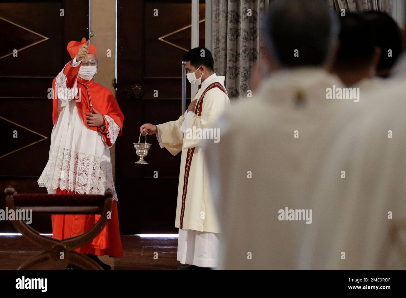 Manila's new Cardinal Jose Fuerte Advincula sprinkles holy