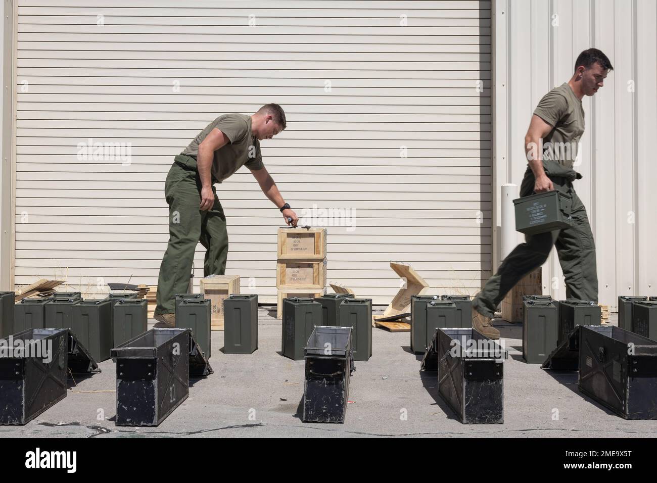 U.S. Marine Corps Cpl. Dylan Seago (left) and Cpl. Eric Lyons, ordnance