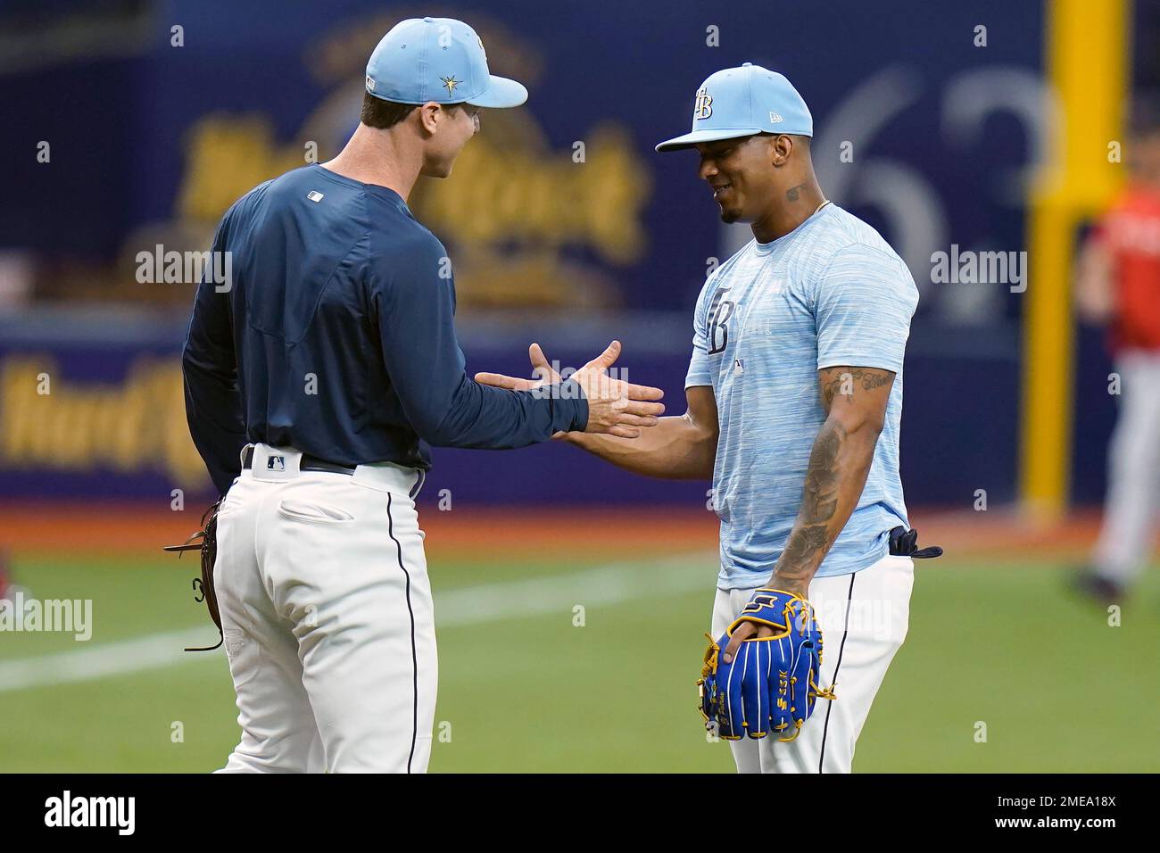 Tampa Bay Rays third baseman Wander Franco, right, shakes hands