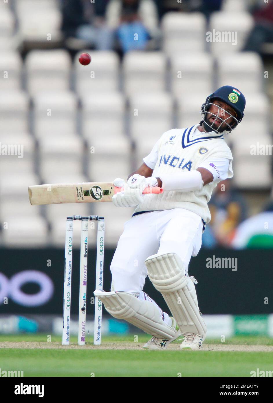Indias Cheteshwar Pujara bends to avoid a rising delivery during the fifth day of the World Test Championship final cricket match between New Zealand and India, at the Rose Bowl in Southampton,