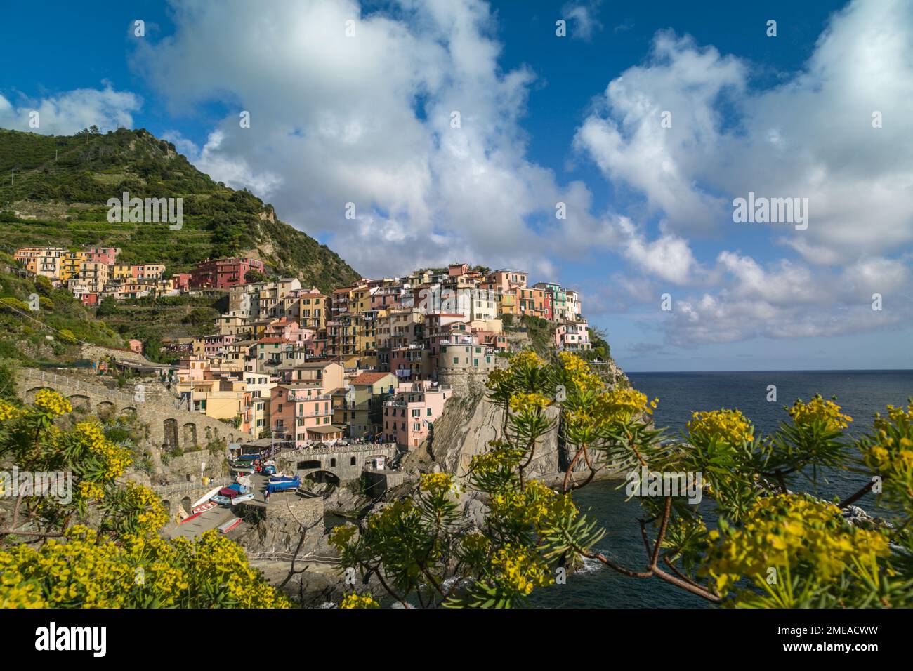 Cliffside Spring View of the colourful buildings in the cliffside coastal village of ...