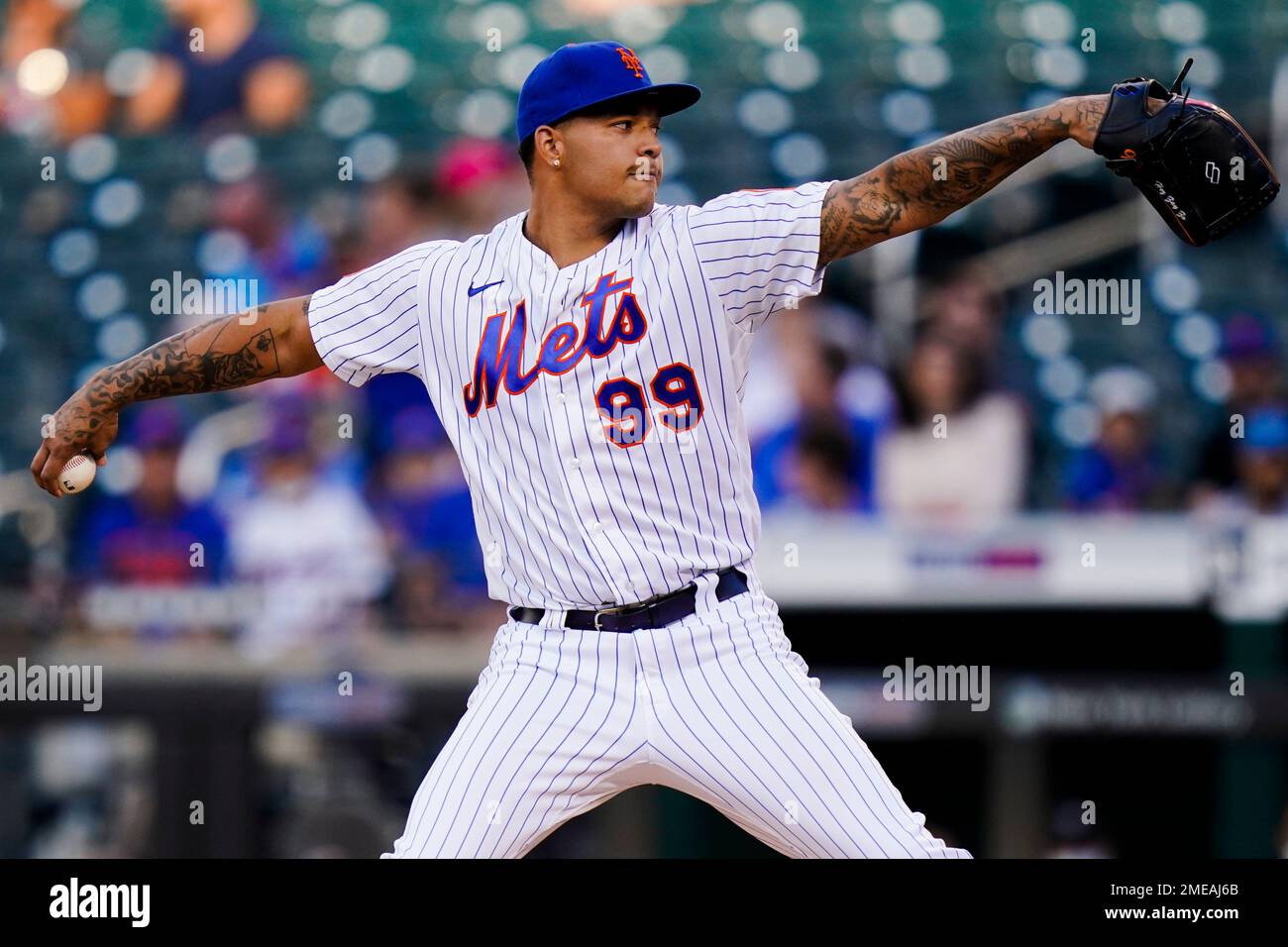 New York Mets' Taijuan Walker delivers a pitch during the first