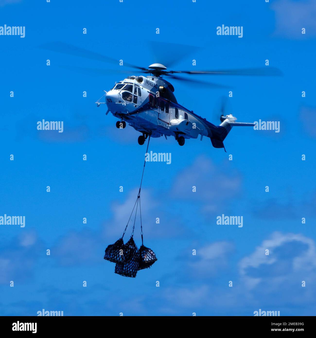 A pilot with the Maritime PrePositioning Force flies an EC255 Super