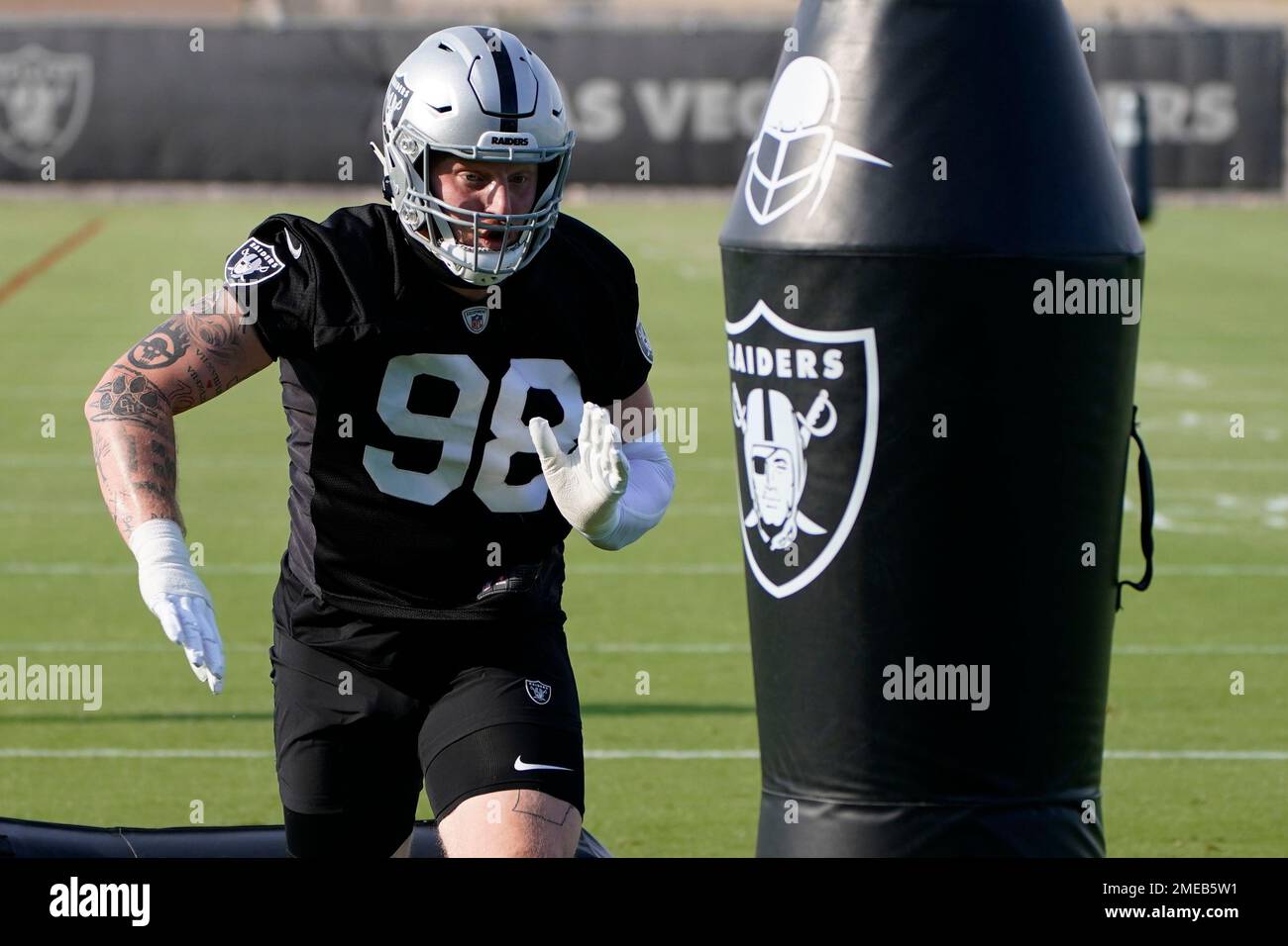 Las Vegas Raiders defensive end Maxx Crosby (98) looks dejected