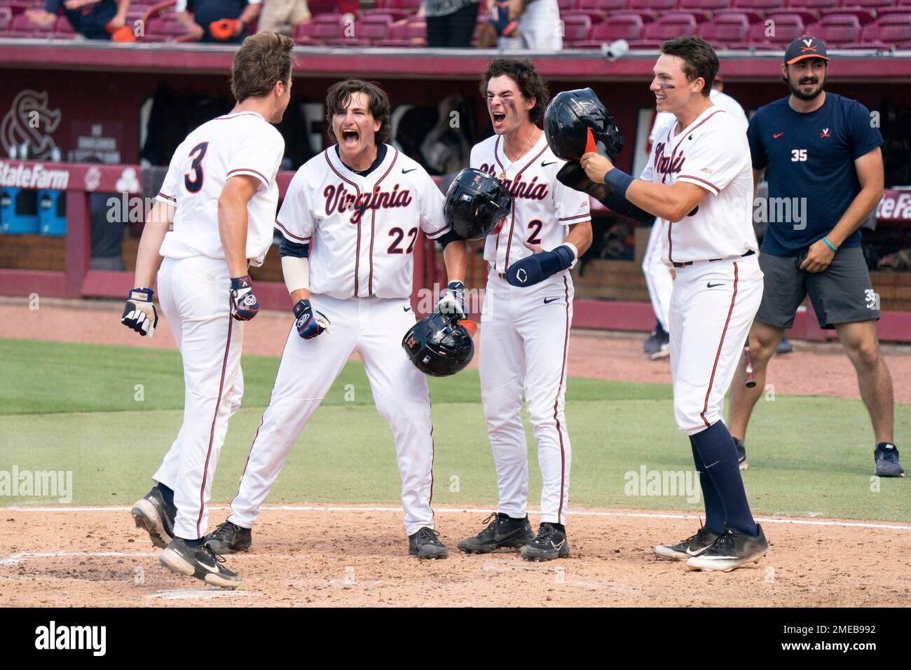 Virginia's Kyle Teel (3) steps on home plate after hitting a grand slam ...