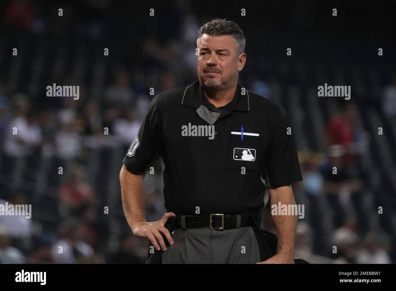 MLB umpire Rob Drake (30) in the first inning during a baseball game  between the Los Angeles Angels and the Arizona Diamondbacks, Sunday, June  13, 2021, in Phoenix. (AP Photo/Rick Scuteri Stock