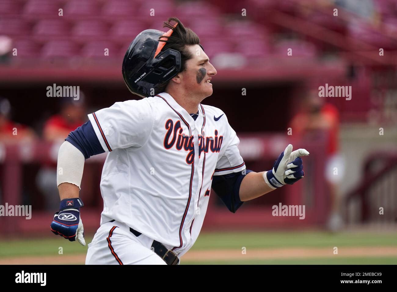 Virginia's Max Cotier runs to first base in the third inning during an
