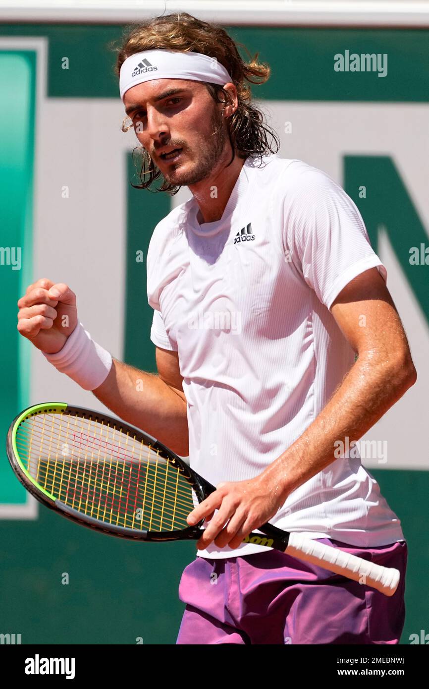 Stefanos Tsitsipas of Greece clenches his fist as he plays Germanys Alexander Zverev during their semifinal match of the French Open tennis tournament at the Roland Garros stadium Friday, June 11, 2021