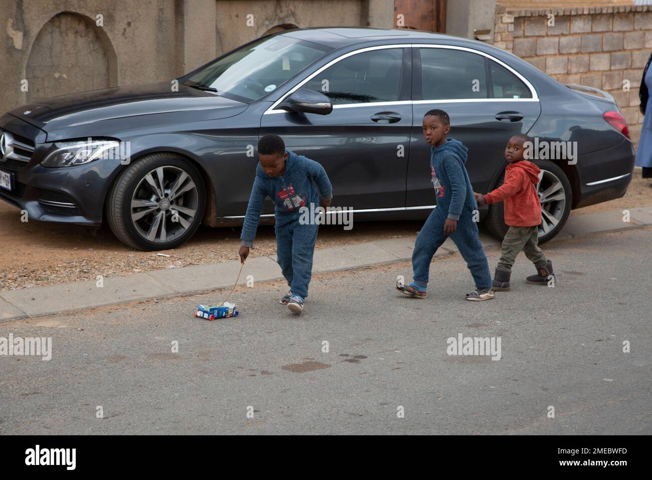 Children play outside the home of Gosiame Thamara Sithole in Tembisa ...