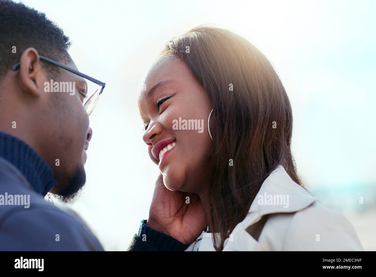 You make me melt. an affectionate young couple bonding together outdoors. Stock Photo