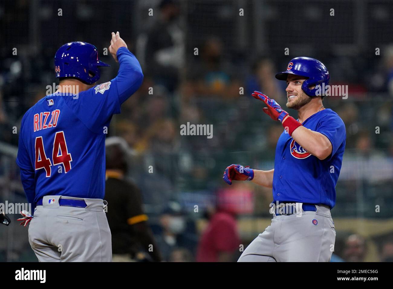 Chicago Cubs' Patrick Wisdom, right, celebrates with Anthony Rizzo