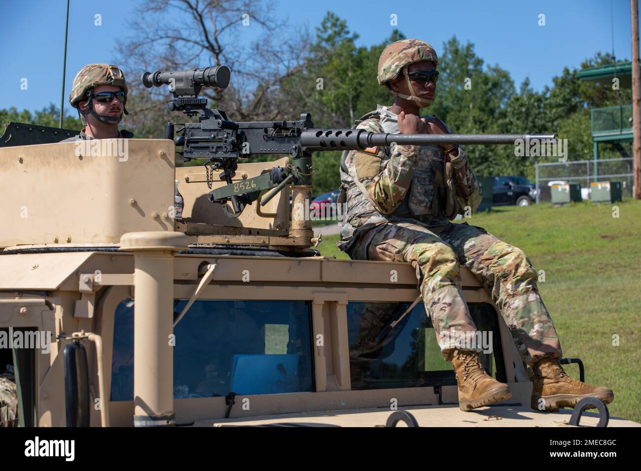 U.S. Army Reserve Spc. Timothy Salazar (left) and Spc. Enzra Kingston, both master gunners with the 84th Training Command, attending Combat Support Training Exercise (CSTX) 86-22-02, completes a M240B machine gun crew-served qualification course as part of Task Force Railgun provided by the 84th Training Command on Fort McCoy, Wisconsin, Aug. 16, 2022. CSTX is an exercise developed to train Army Reserve units and Soldiers to deploy on short-notice and bring capable, combat-ready, and lethal capabilities in support of the Army and our joint partners anywhere in the world Stock Photo