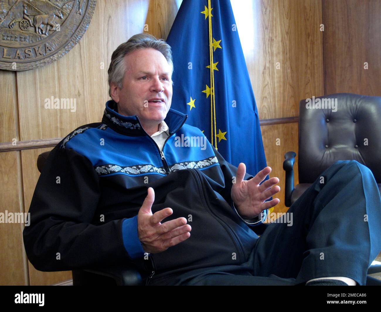 Alaska Gov. Mike Dunleavy gives an interview in the state Capitol on