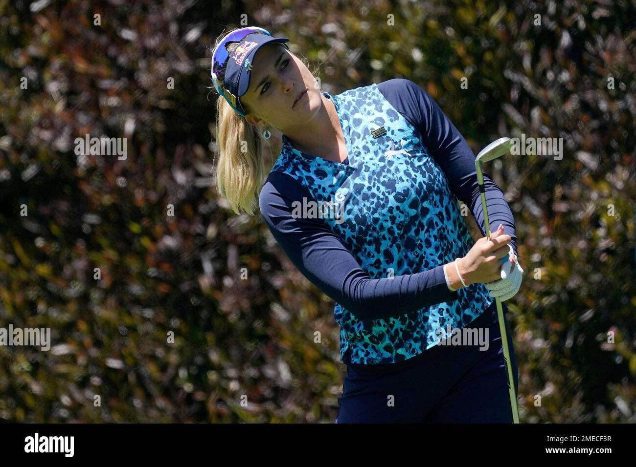 Lexi Thompson watches her shot from the 13th tee during the final round