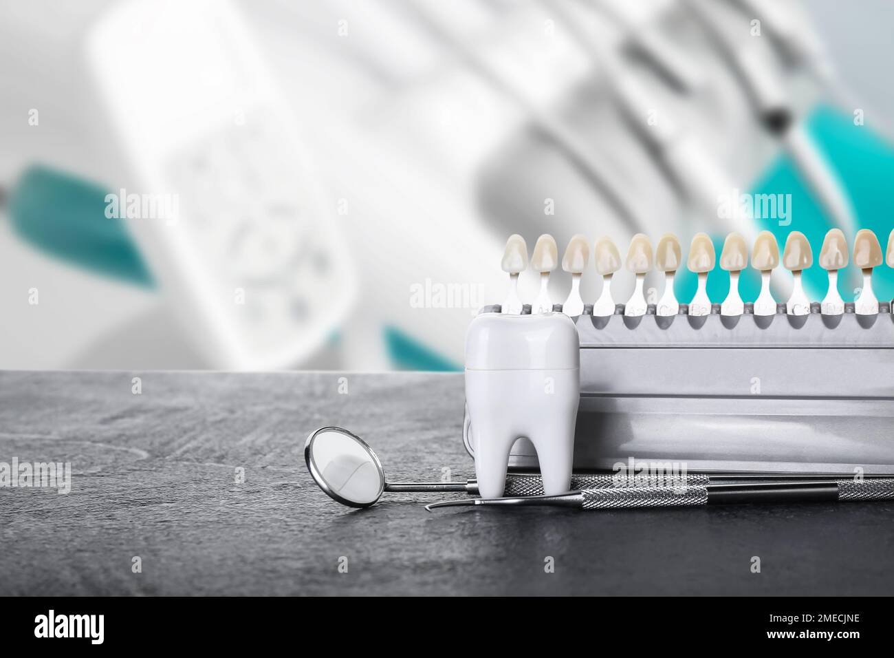 Teeth color chart with dental tools on table in clinic Stock Photo Alamy