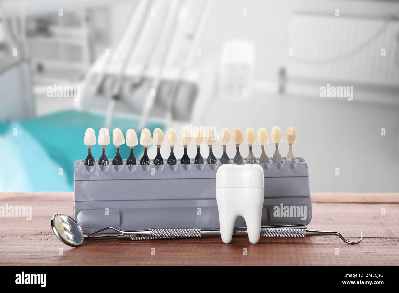 Teeth color chart with dental tools on table in clinic Stock Photo Alamy