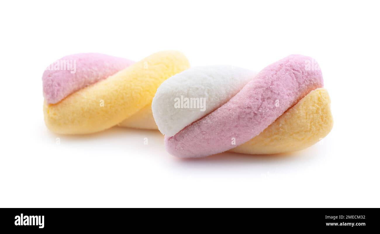 Tasty twisted marshmallows isolated on white background Stock Photo - Alamy