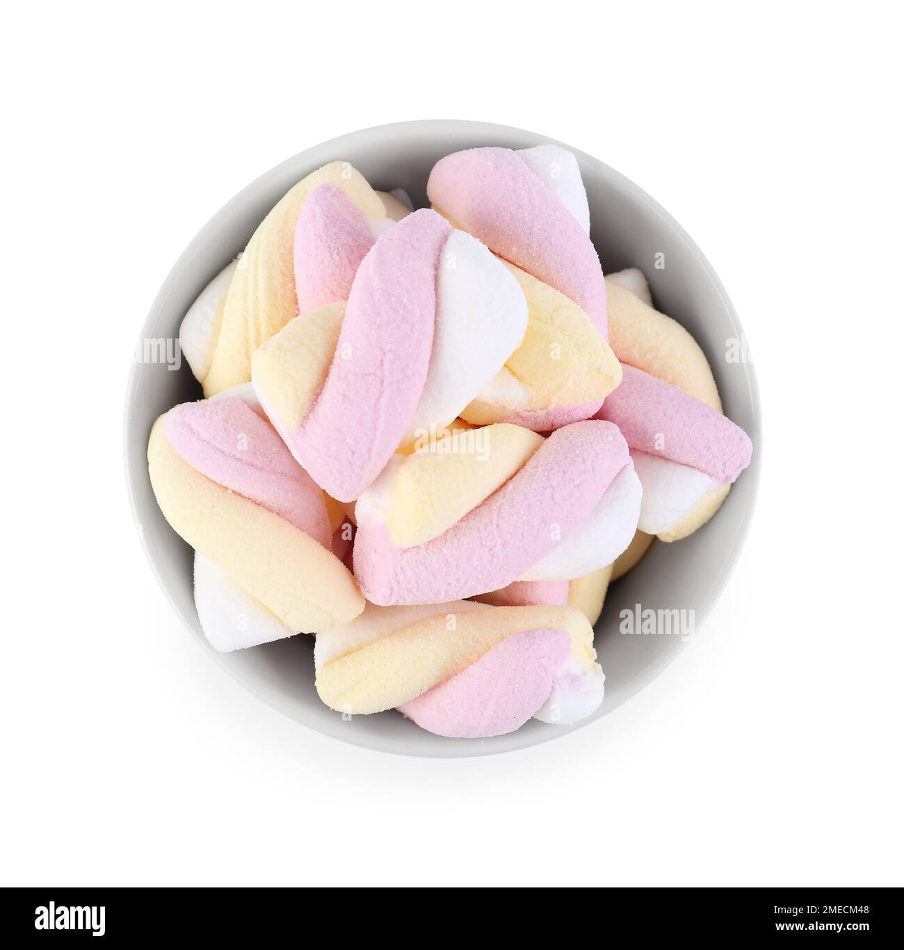 Bowl with tasty twisted marshmallows isolated on white background Stock ...