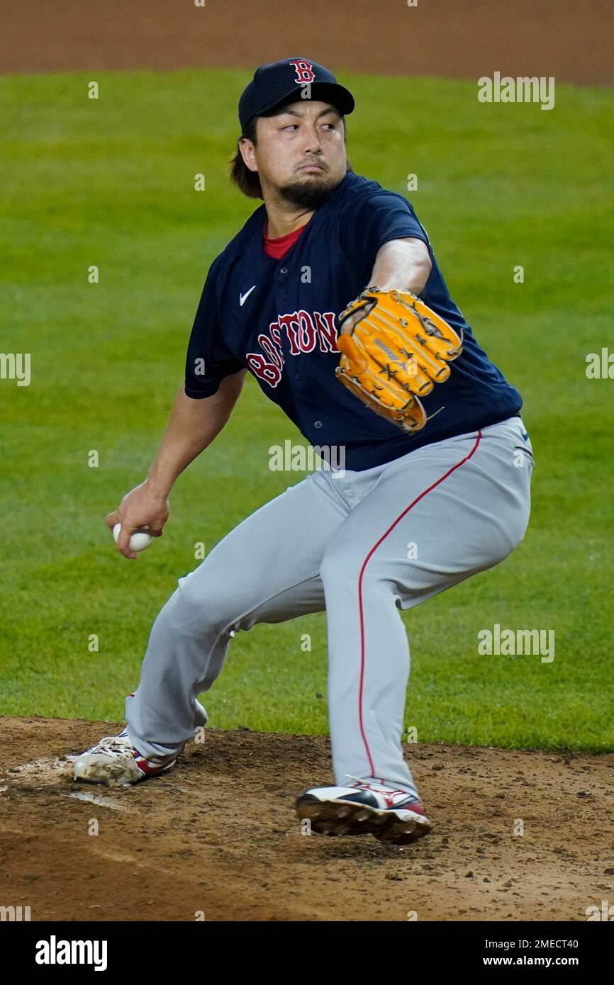 Hirokazu Sawamura of the Boston Red Sox pitches in a baseball game