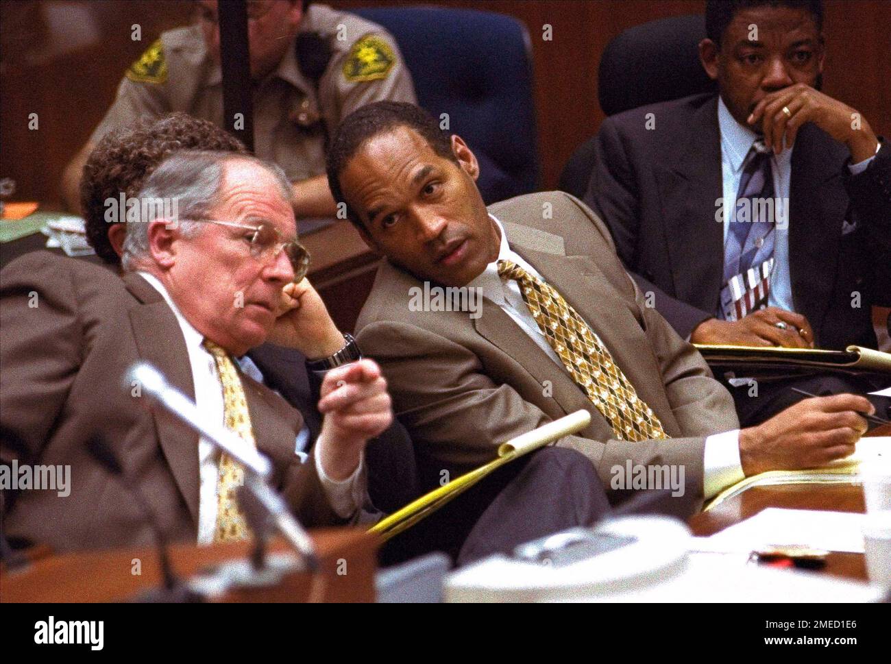 Lee Bailey of Boston, left, attorney for Dr. Samuel H. Sheppard, right,  talks with newsmen, after arguing the former Cleveland, Ohio, osteopath's  case before the Supreme Court in Washington on Feb. 28